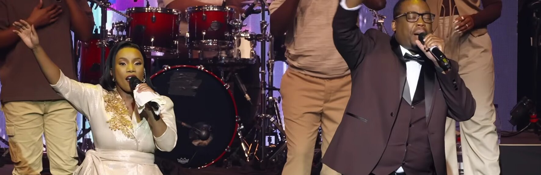 Phindi P hosting an event on stage