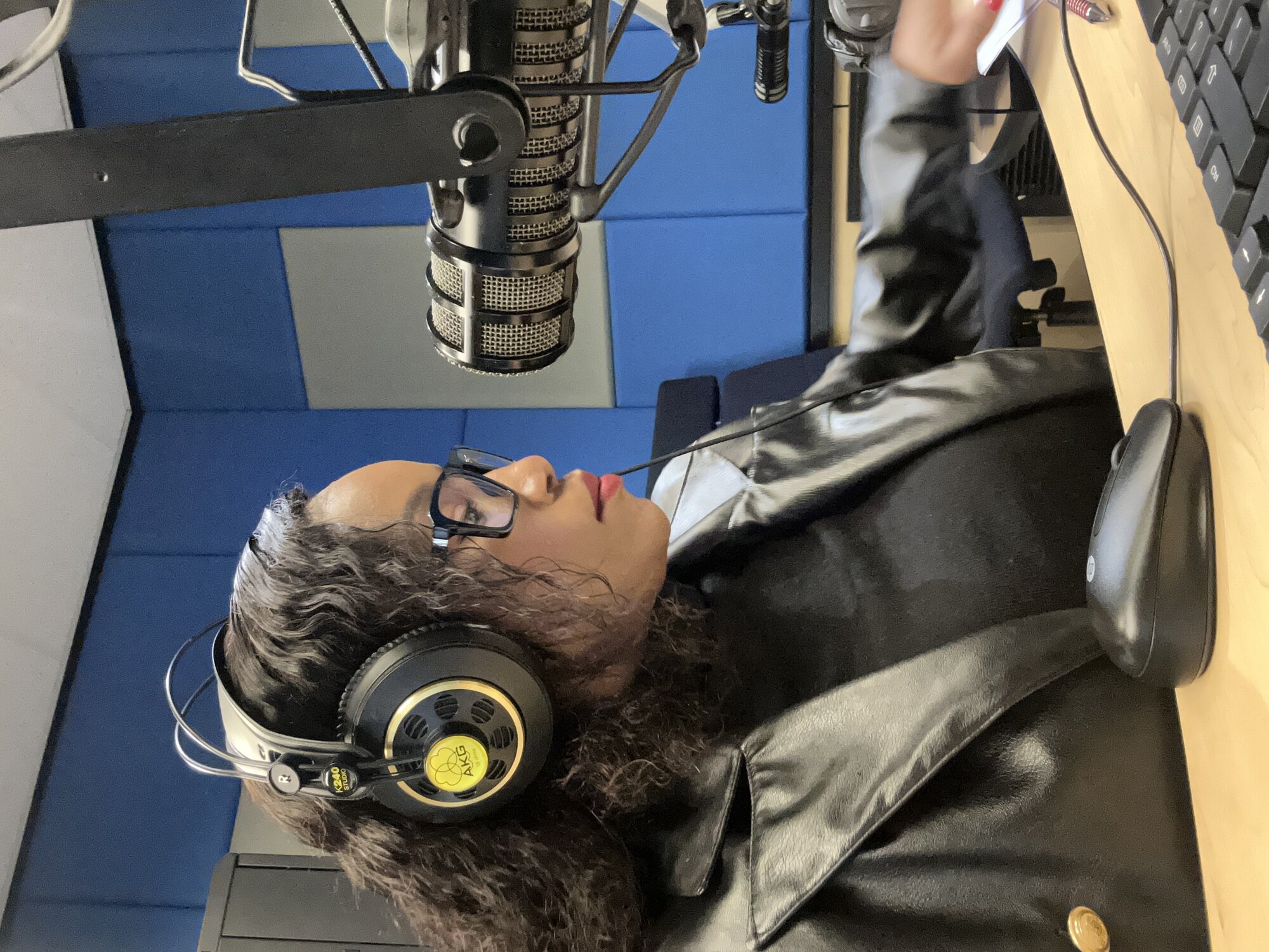 Phindi P in the radio studio, on air